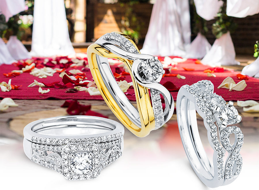 Display of three custom design engagement rings with matching bands