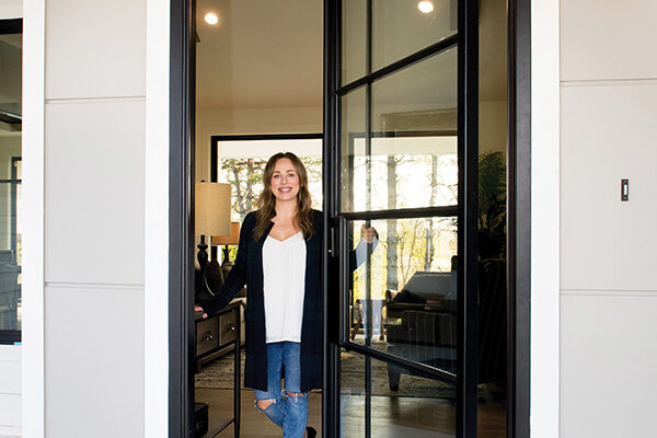 woman standing in custom pivot door