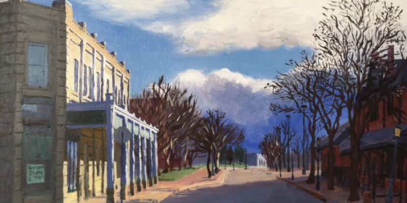 A painting of a street with buildings on both sides by local artist Bill Goffrier called, “Douglas and Mead."